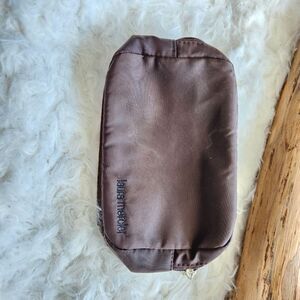 Laura Mercier small brown cosmetic pouch